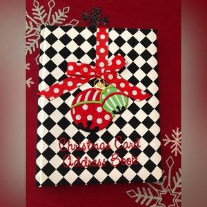 Christmas Address Book with appliqué bells and ribbons.Black and white check.
